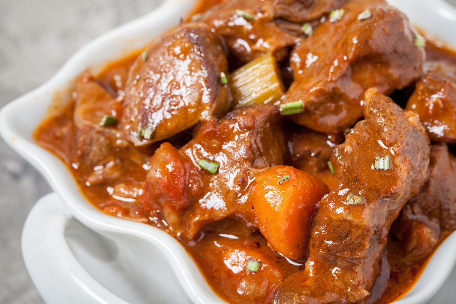 Beef stew with beer, rosemary and vegetables